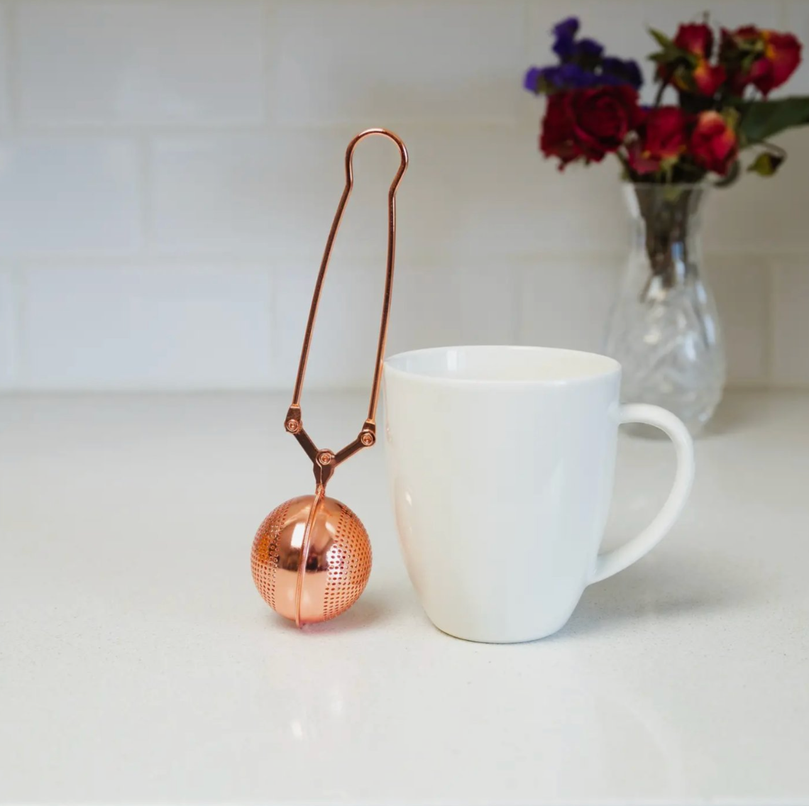 Rose gold tea strainer